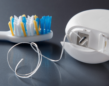 Brushing vs. Flossing: The Ultimate Oral Hygiene Showdown- treatment at Martinsville Family Dentistry  